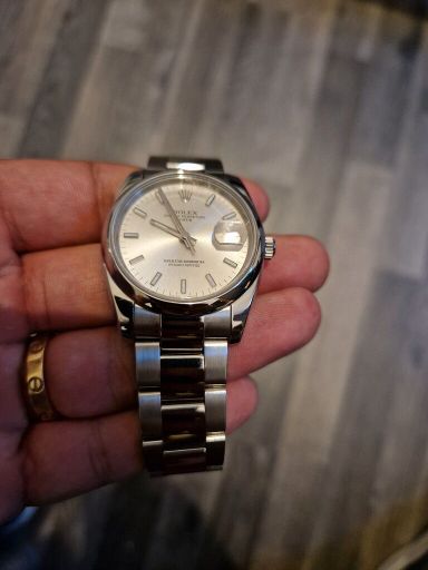 Rolex date 115200