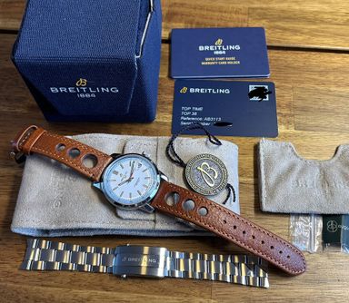 Breitling Top Time B31 op staal + extra leer