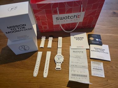 TK: Moonswatch Mission to the moonphase wit