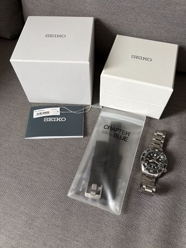 Tk: Seiko SPB383J1 Diver’s GMT zwart, met Crafter Blue rubber