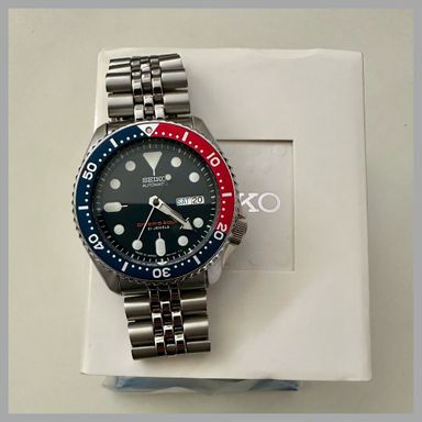 Te Koop: Seiko SKX009J1 Nieuw in doos op staal en rubber