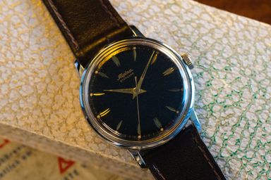 Alpina 598 Standard "Glossy Black Dial" retailed by Franz Ströbel