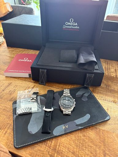 Omega speedmaster 3861 hesalite + adjustment clasp + extra omega band voor 5650,-