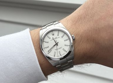 TK/TR Rolex Oyster Perpetual 114300 white dial