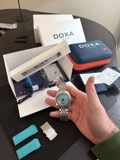 Doxa Sub 300 Aquamarine - Stalen band + originele rubberen band